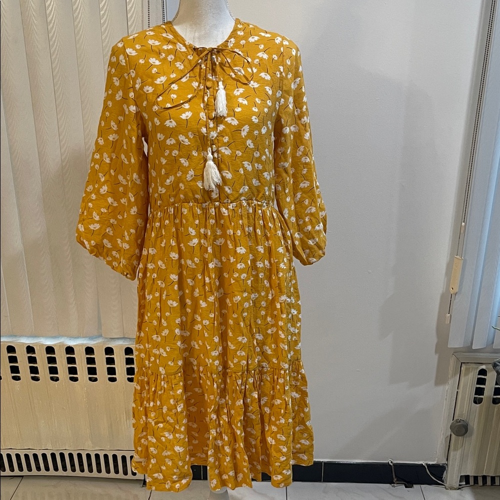 Floral mustard, color dress with tassel size XS excellent condition
